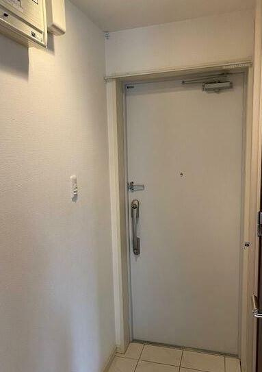 川崎市多摩区生田３丁目の賃貸マンションの玄関