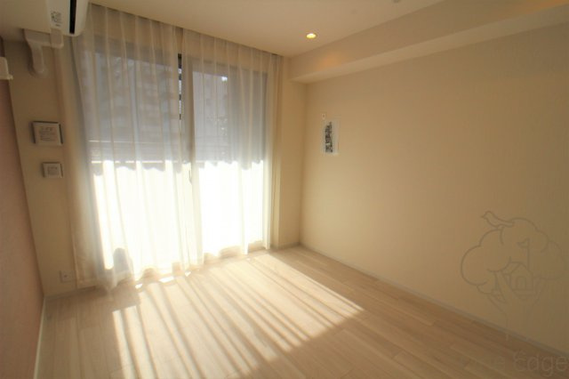 ミッドコート東三国の寝室