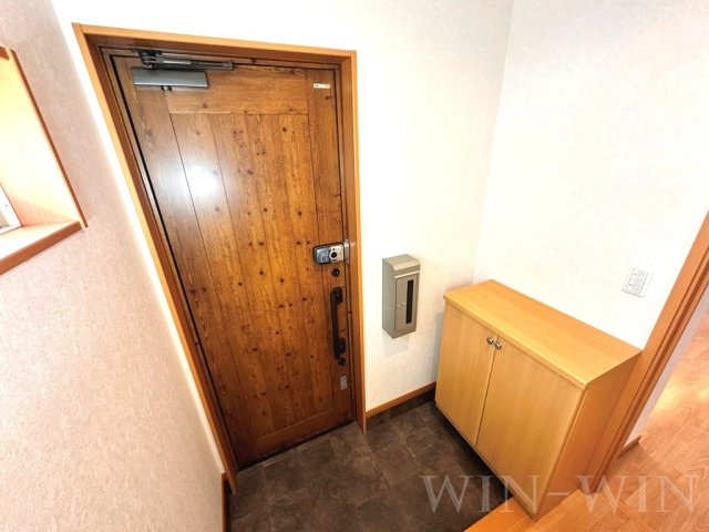 八通町賃貸住宅の玄関