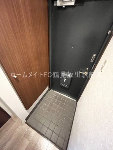 クイーンライフＩＭＡＺＵの玄関