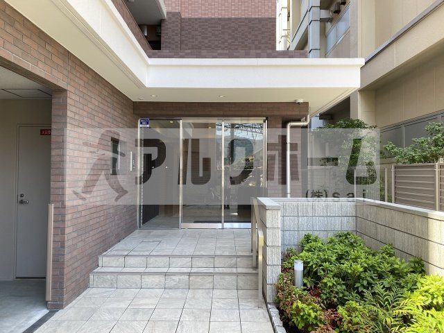 スタシオン河内山本のエントランス