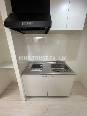 明成中津ビルのキッチン|コンパクトなキッチンで掃除もラクラク