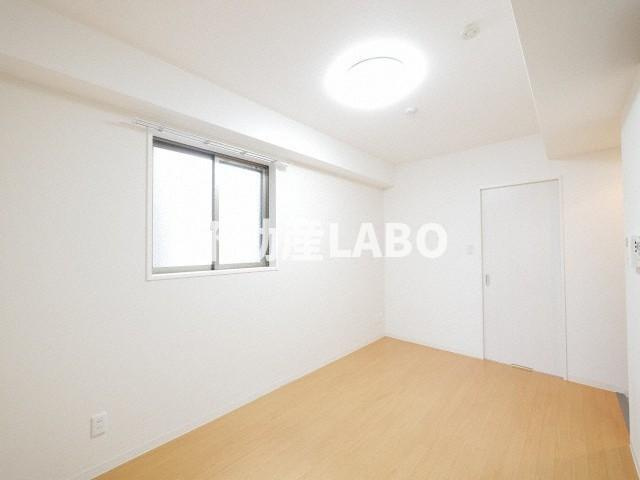 トモ南堀江の洋室