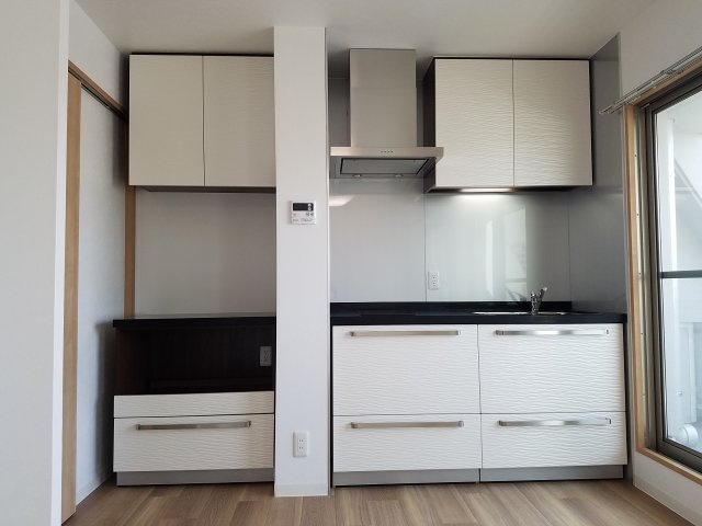 ディアコート八木のキッチン|IHクッキングヒーターのシステムキッチン