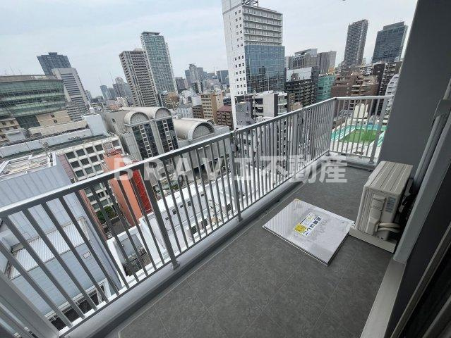 アーバネックス南新町 BRAVI不動産のバルコニー|暖かな日差しのふりそそぐバルコニー