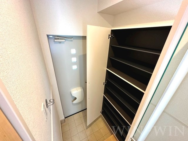 プランドール スギ Aの玄関