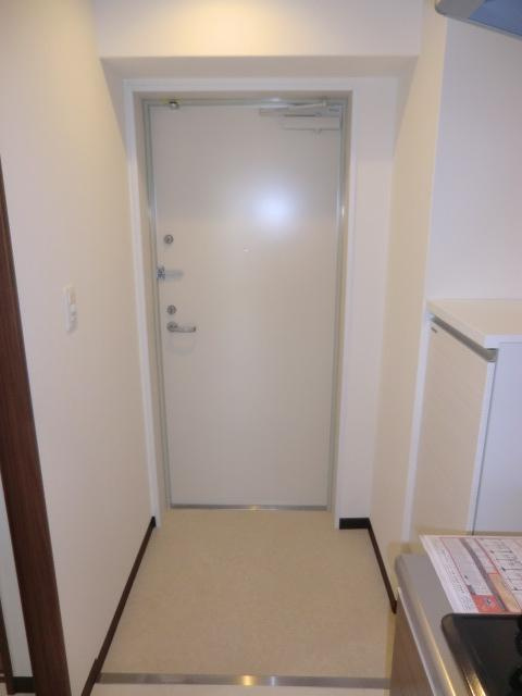 大阪市淀川区十三東２丁目の賃貸マンションの玄関