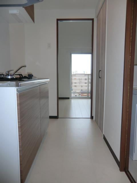 大阪市淀川区十三東２丁目の賃貸マンションの玄関