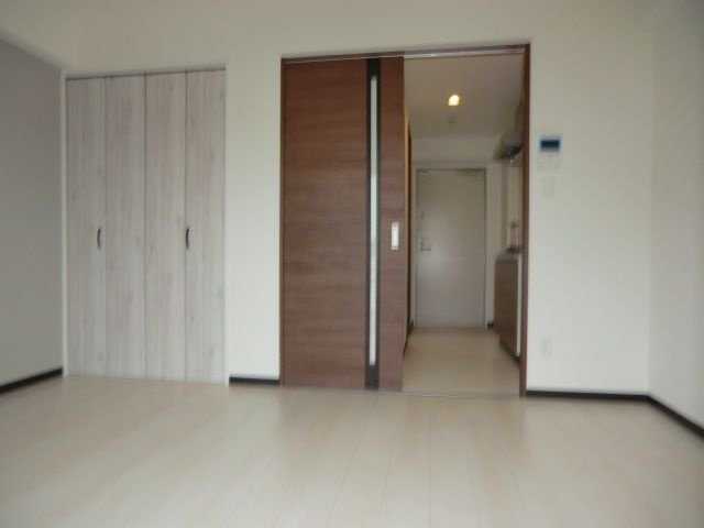 大阪市淀川区十三東２丁目の賃貸マンションの居間・リビング