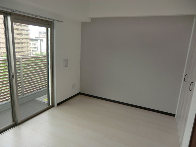 大阪市淀川区十三東２丁目の賃貸マンションの寝室