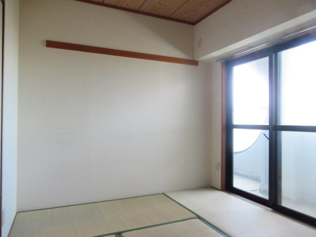 メゾンIYASAKAの寝室