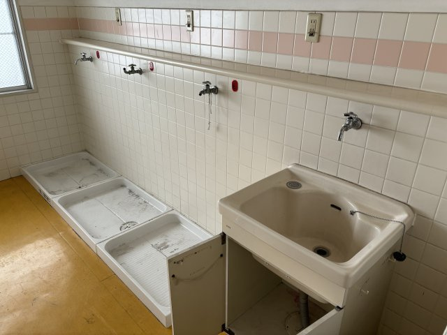 本町一棟ビルのその他共用部分|洗濯スペース1階