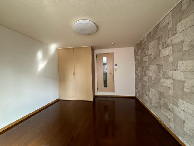 リッチウォーク市役所前Ａ棟の居間・リビング