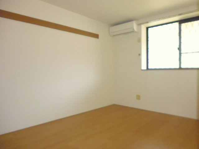 ヴィラ・エバーグリーンの寝室|洋室