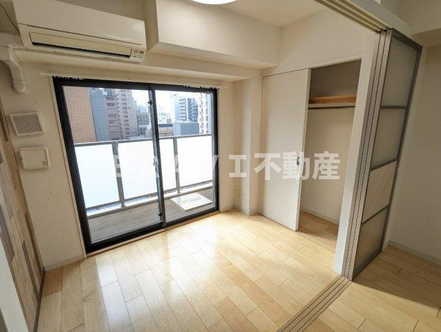 グランプラス谷町 BRAVI不動産の洋室