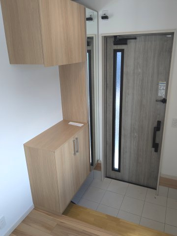 都城市平塚町の新築一戸建の玄関