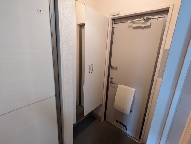 プレジール田無の玄関