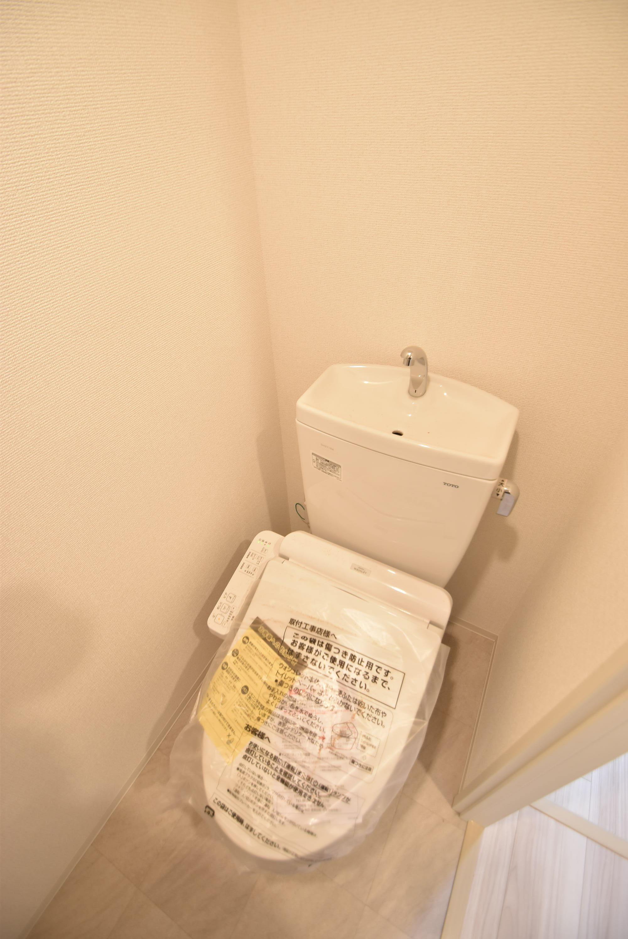 大阪市城東区蒲生１丁目の賃貸マンションのトイレ