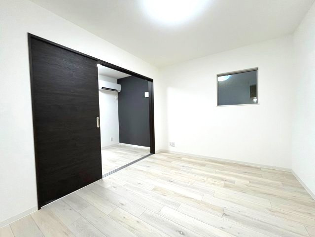ジーメゾン寝屋川秦町ルシェールの居間・リビング