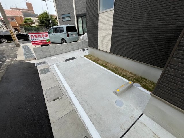 ジーメゾン寝屋川秦町ルシェールの駐車場