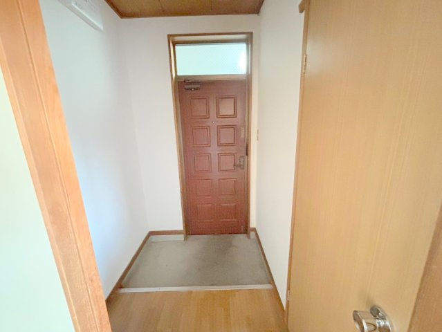 生駒市壱分町の賃貸マンションの玄関