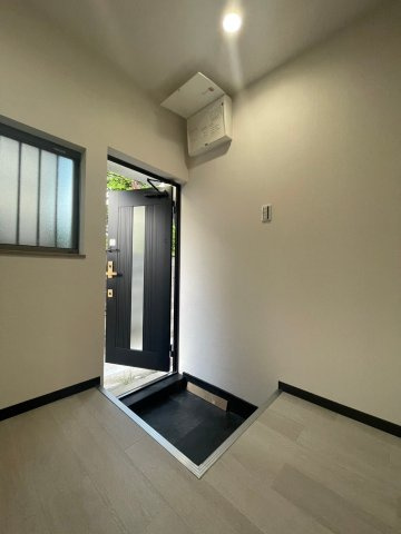 春日3丁目テラスハウスの玄関