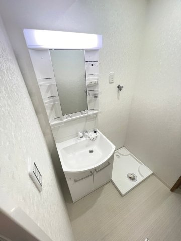 春日3丁目テラスハウスの洗面所