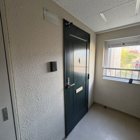 ティアラ高砂ハイツの玄関