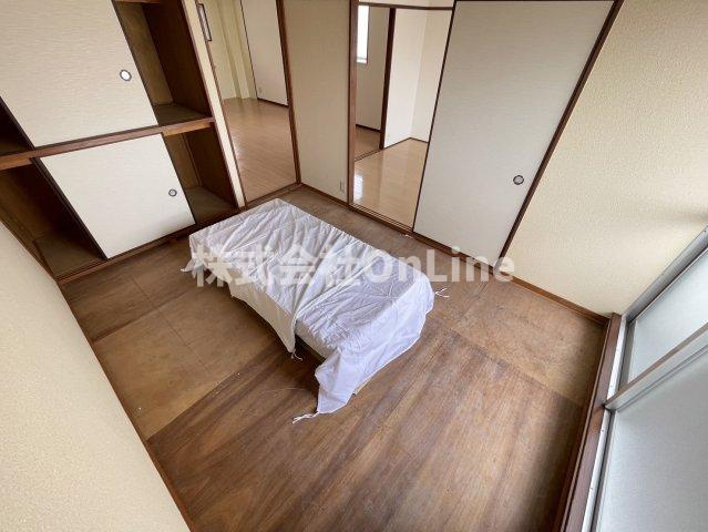 八尾市東山本町３丁目のアパートの寝室