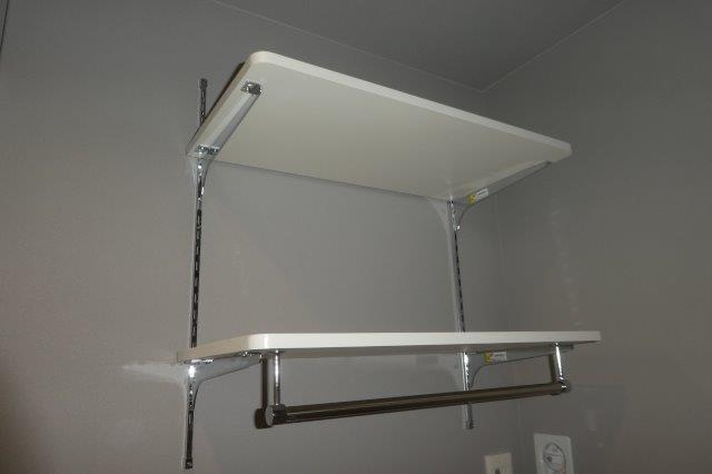 ディマーネⅡの洗面所|洗濯機上棚