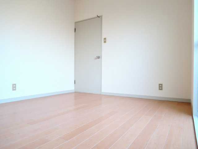 西町ロイヤルマンションの寝室