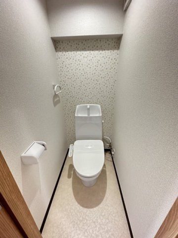 アルファクリオコートのトイレ|落ち着いた色調のトイレです