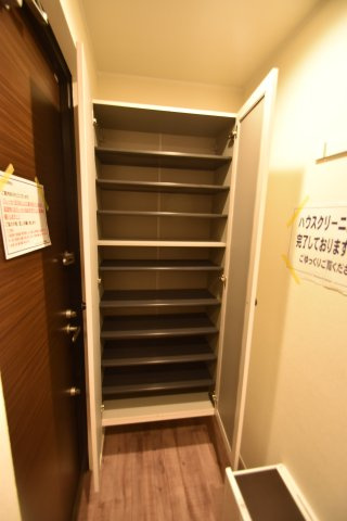大阪市都島区都島北通１丁目の賃貸マンションの玄関