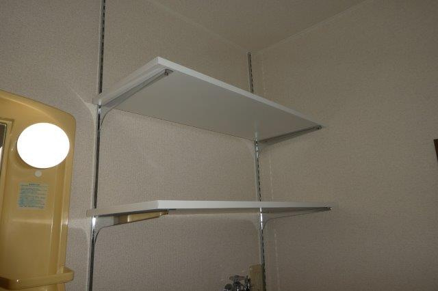 ニューエクセル三宅Ｅの洗面所|洗濯機上棚