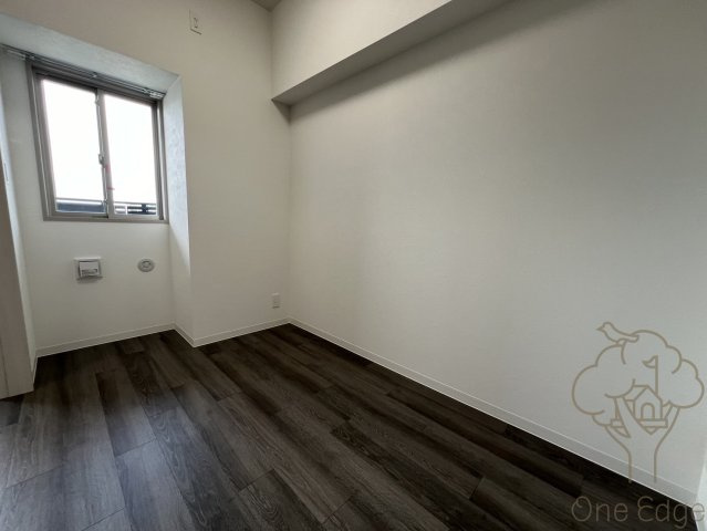 プレサンス塚本ベラビィの寝室