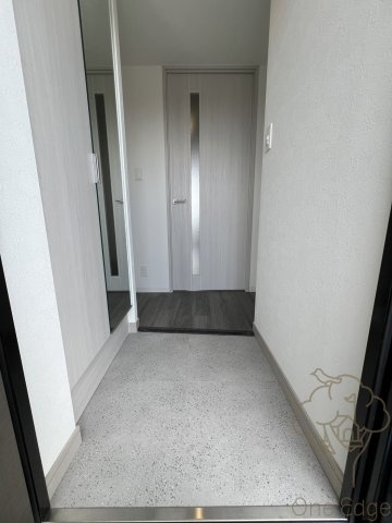 プレサンス塚本ベラビィの玄関
