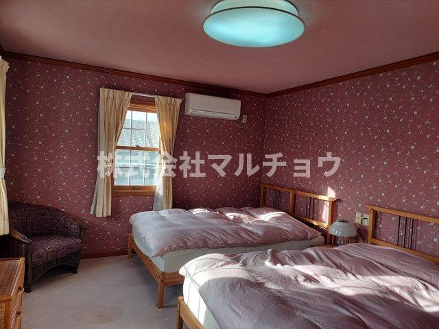サニービーチ戸建ての寝室|落ち着いた色調の寝室です
