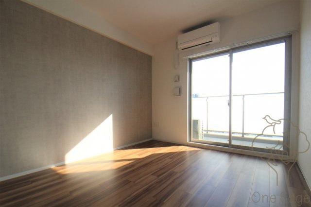 レジュールアッシュ三国本町の居間・リビング