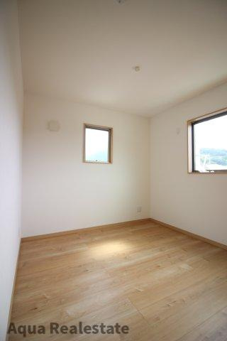 宇多津町長縄手　新築未入居戸建ての寝室|落ち着いた色調の寝室です