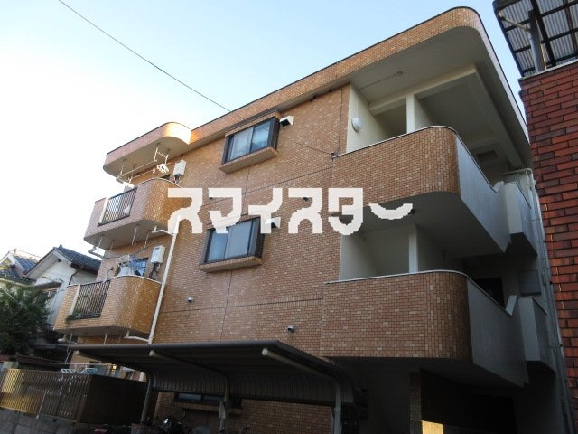 福生市大字熊川の賃貸マンションの外観