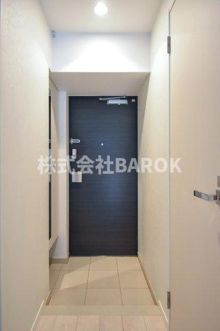 福岡市博多区美野島３丁目の賃貸マンションの玄関
