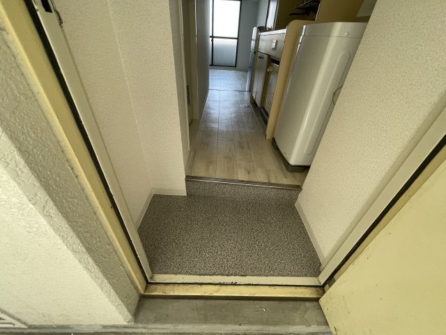 メゾンUQの玄関