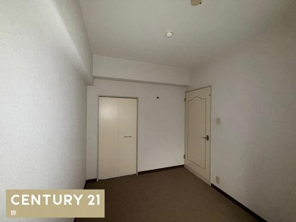 サンライズマンション岩出7の洋室