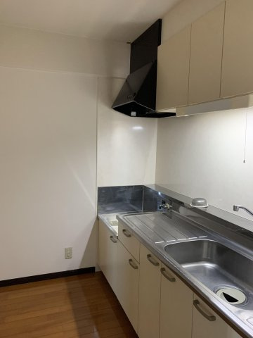 QM壱番館のキッチン|使いやすい居間です