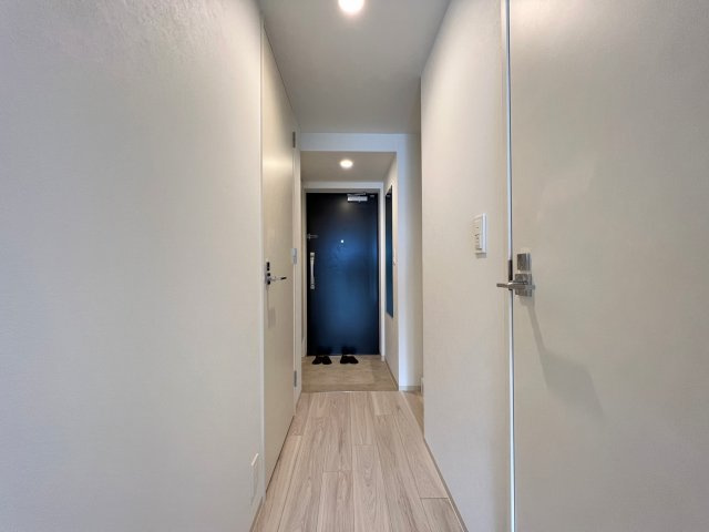 コンフォリア・リヴ南森町Qの玄関