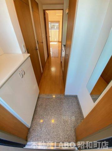 レジュールアッシュ天王寺の玄関