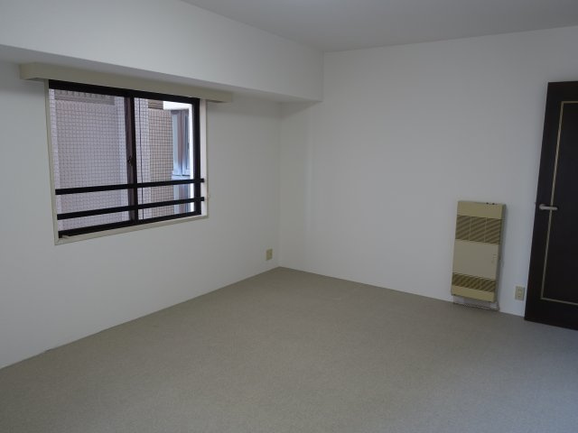 リヴィエール万代の洋室