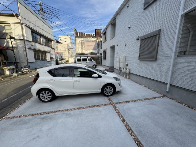 リベルタFussaの駐車場