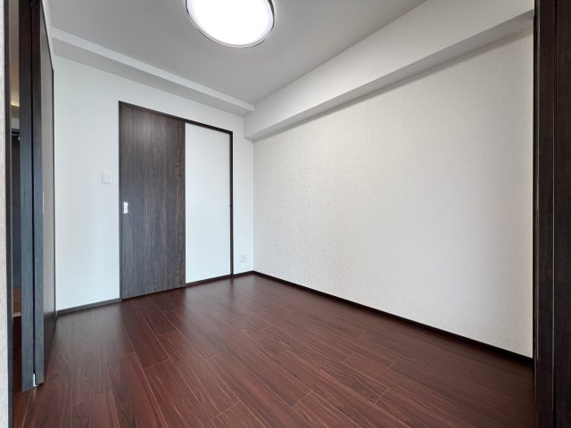 Vinoプレジオ本町の洋室