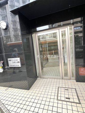 初穂マンションひがし京橋　最　上階　リ　フォーム済のエントランス